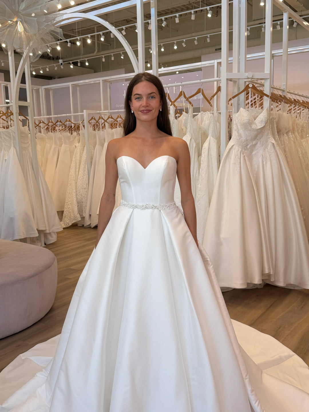 Full front of Luxe Privée Sierra Belt in ivory beaded trim on a satin A-line gown with leafy accents and sparkling beads