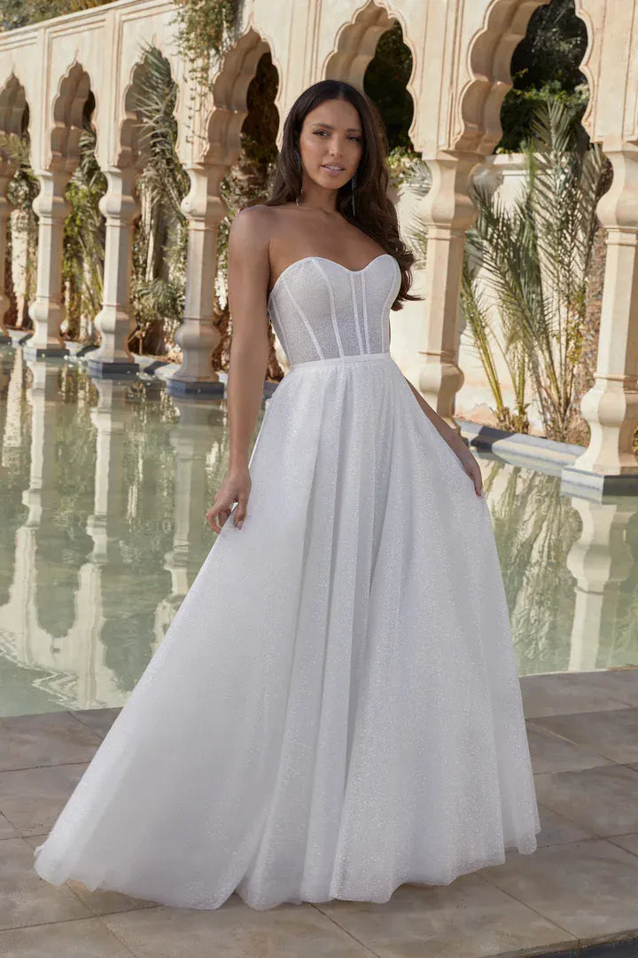 full front of sincerity bridal 44442 ivory glitter tulle a-line wedding dress featuring a strapless sweetheart neckline and flowy a-line skirt
