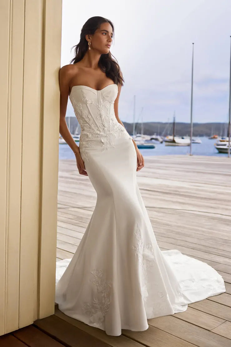 front of sophia tolli y3205 ivory crepe fit and flare wedding dress, showing the full front with sweetheart neckline and floral appliques