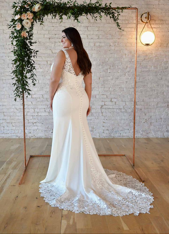 back of stella york 7335 ivory crepe fitted wedding dress, showing the full back with the lace train