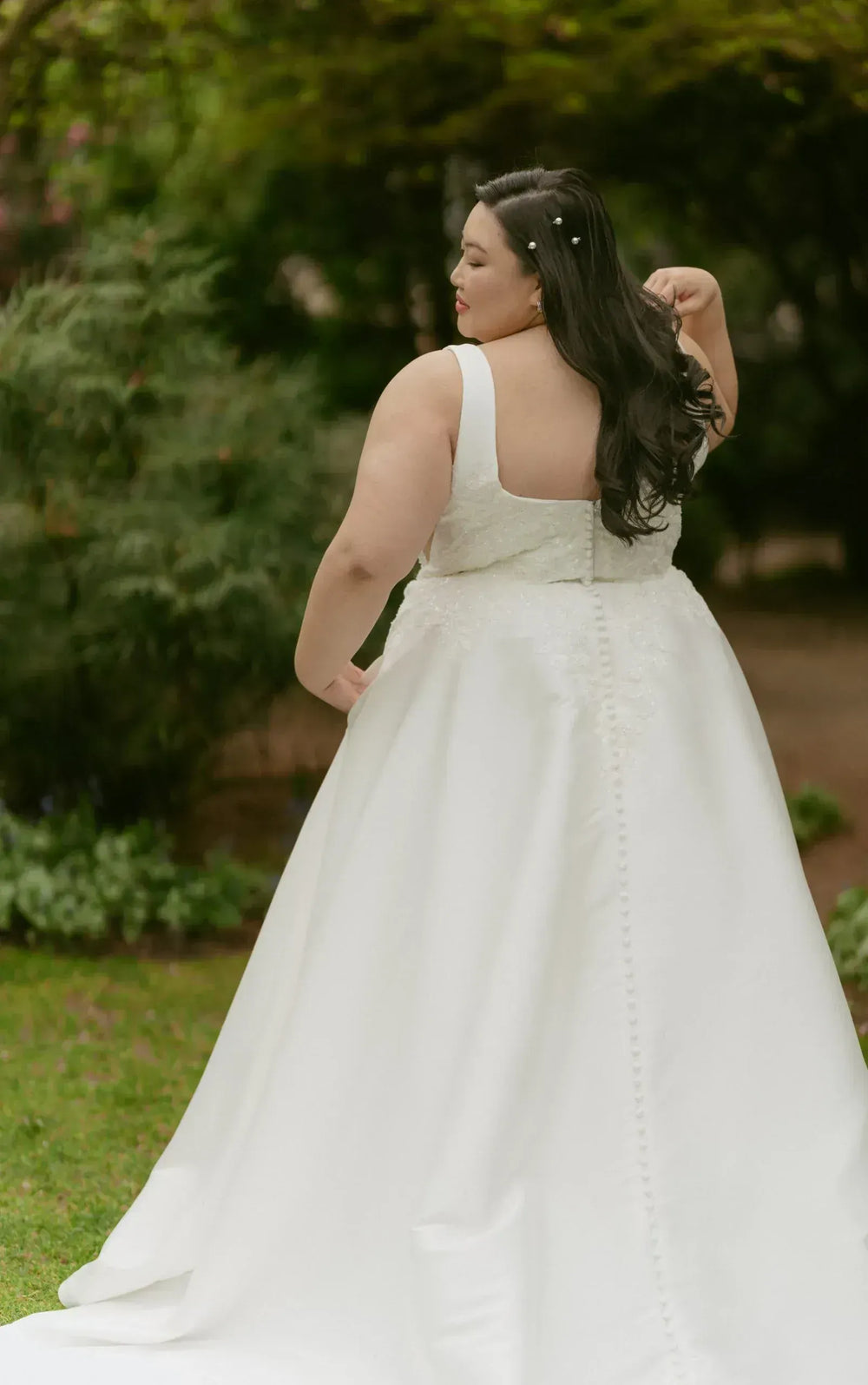 full back of stella york 7897 ivory mikado a-line wedding dress with beading on the square neck bodice and a full skirt