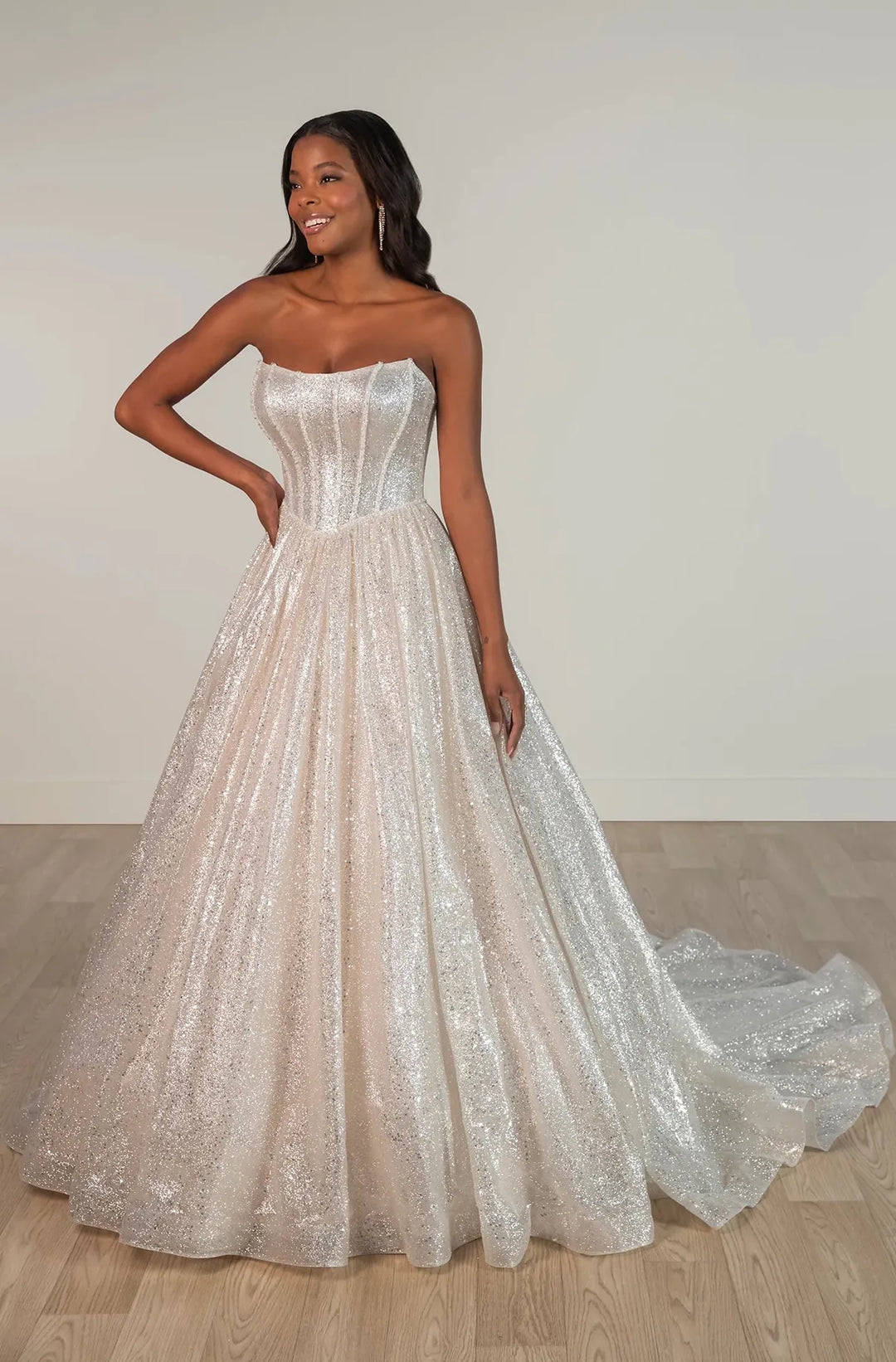 front of stella york sy8133 champagne sequined ball gown wedding dress with a basque waist and strapless scoop neckline