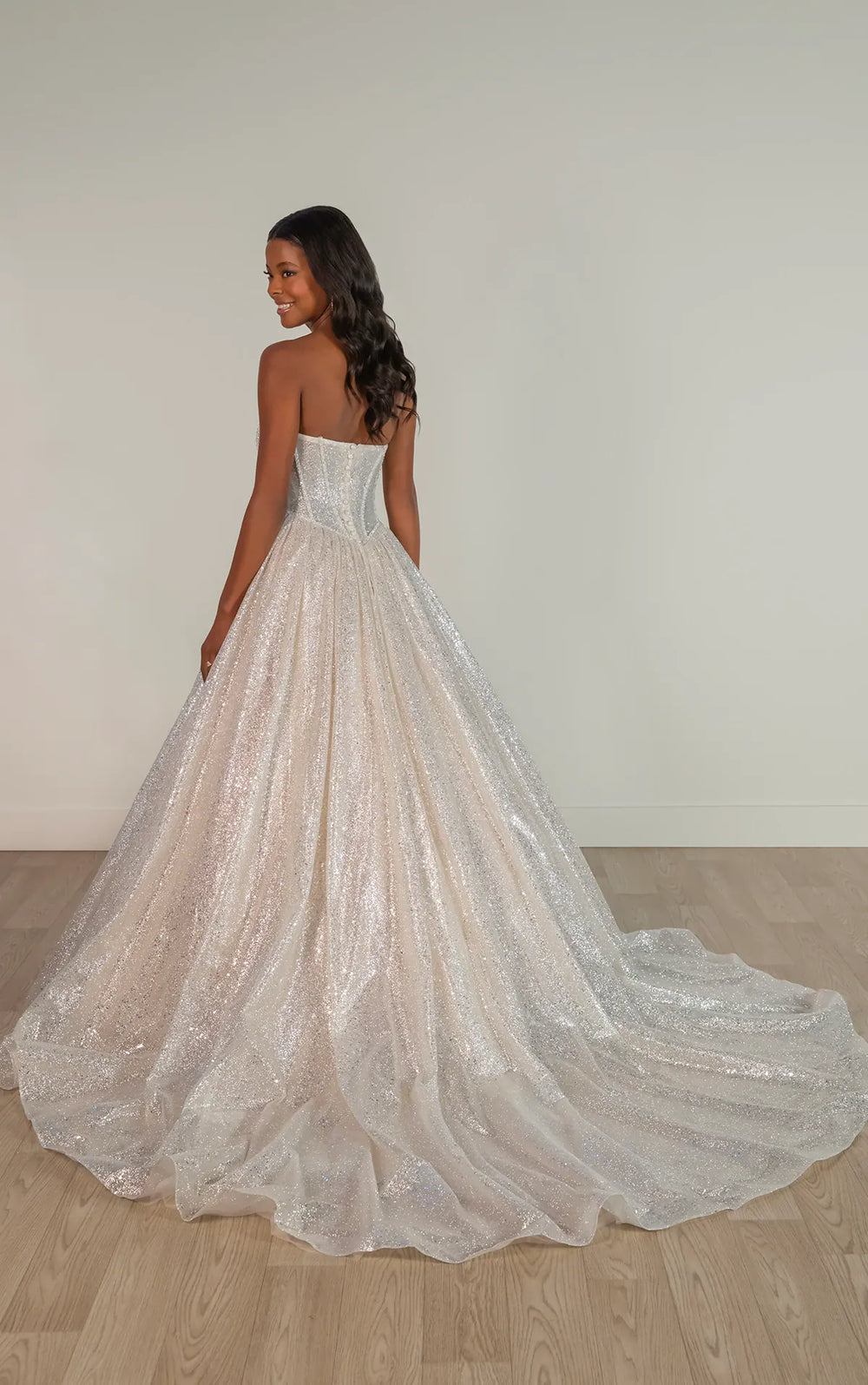 back of stella york sy8133 champagne sequined ball gown wedding dress with a basque waist and chapel length train