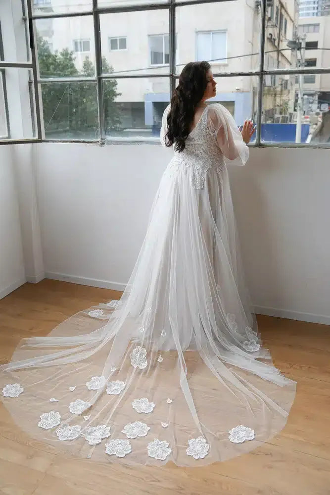 full back of studio levana tulle ivory a-line wedding dress with sheer lace train with lace appliques