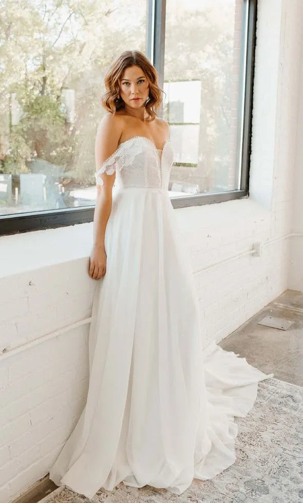 front of tara latour june ivory mesh a-line wedding dress, showing the full front with off the shoulder neckline and long train