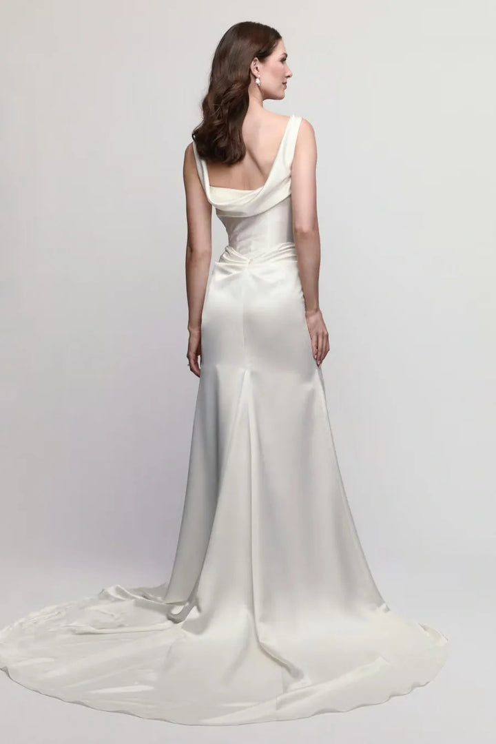full back of locket by watters amaryllis ivory charmeuse sheath wedding dress featuring draped back and a chapel length train