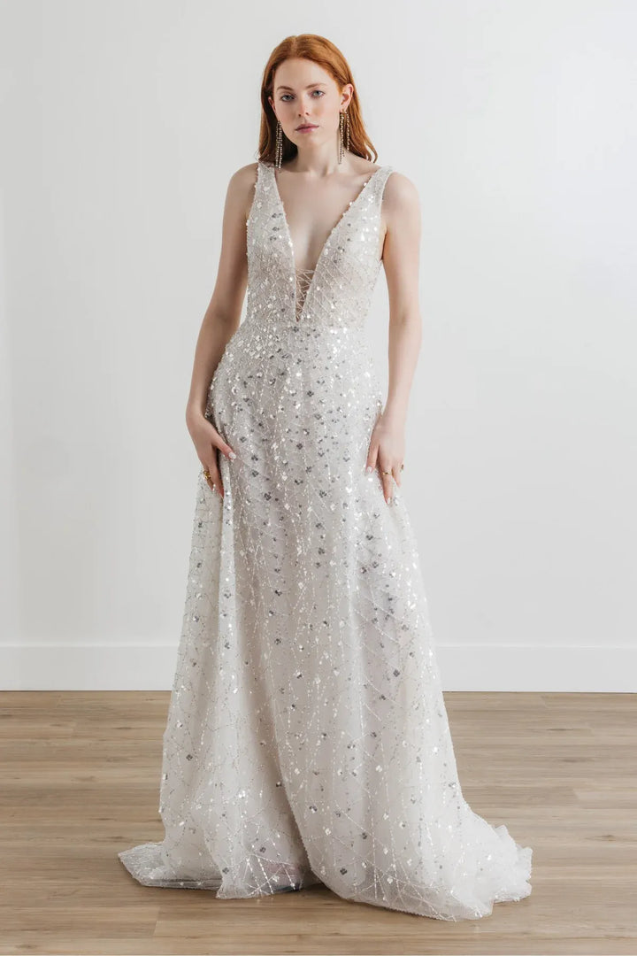 full front of willowby by watters odessa platinum beaded a-line wedding dress with a deep v neckline