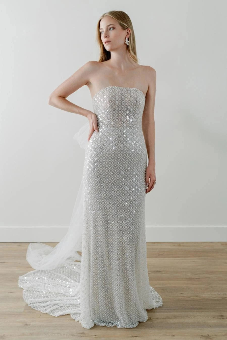 front of watters ondrea ivory beaded fitted wedding dress, showing the full front with strapless bodice and slim skirt