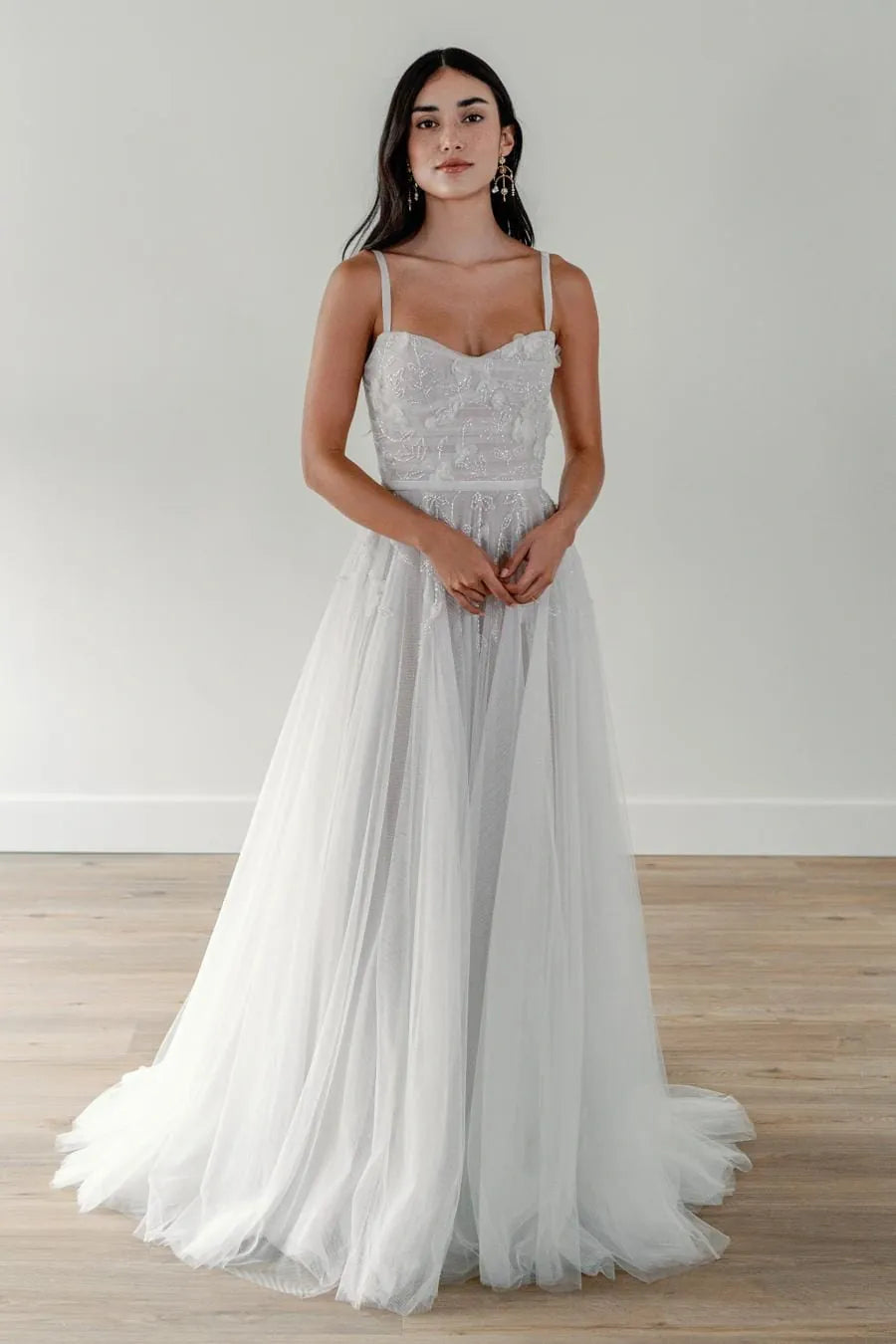 front of willowby by watters champagne tulle a-line wedding dress with sweetheart neckline, appliques on the bodice, and flowy skirt