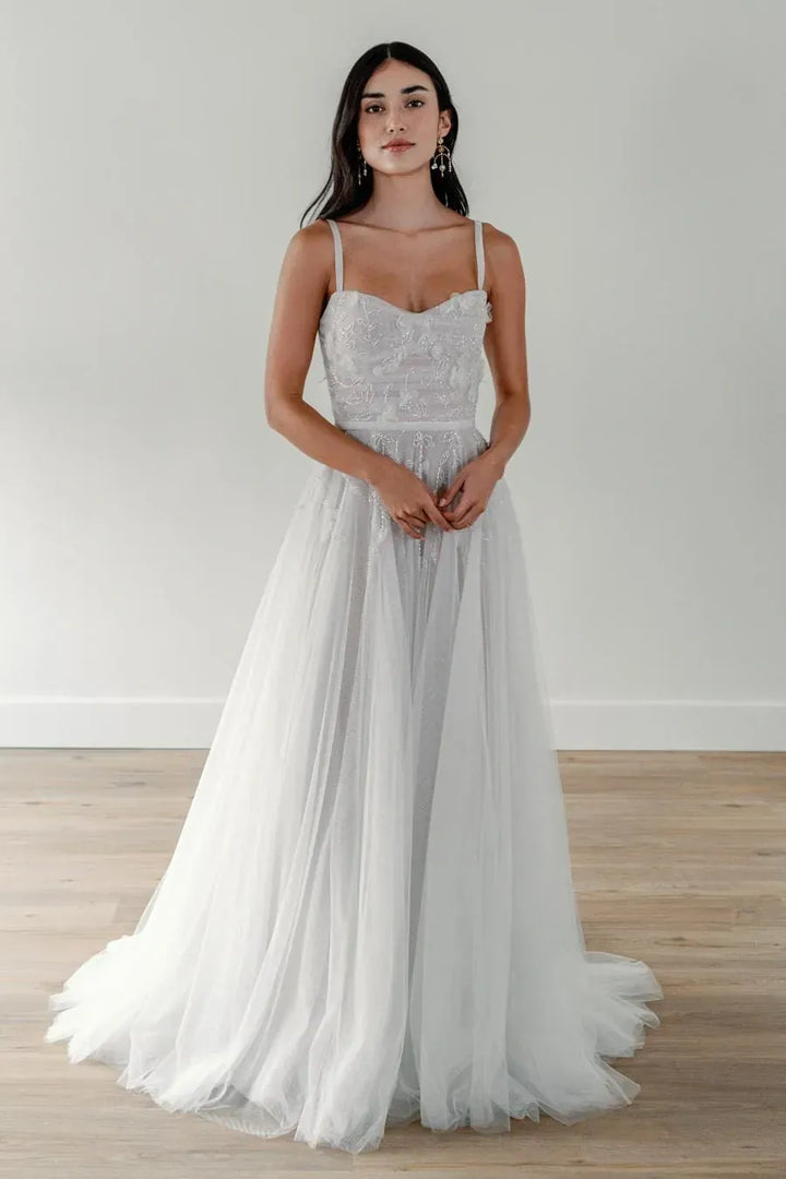 full front of willowby alula ivory tulle a-line wedding dress with lace details on the sweetheart bodice