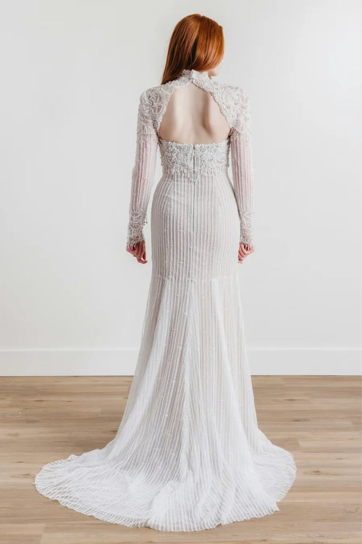 full back of willowby jade silver beaded sheath wedding dress with a matching long sleeve topper