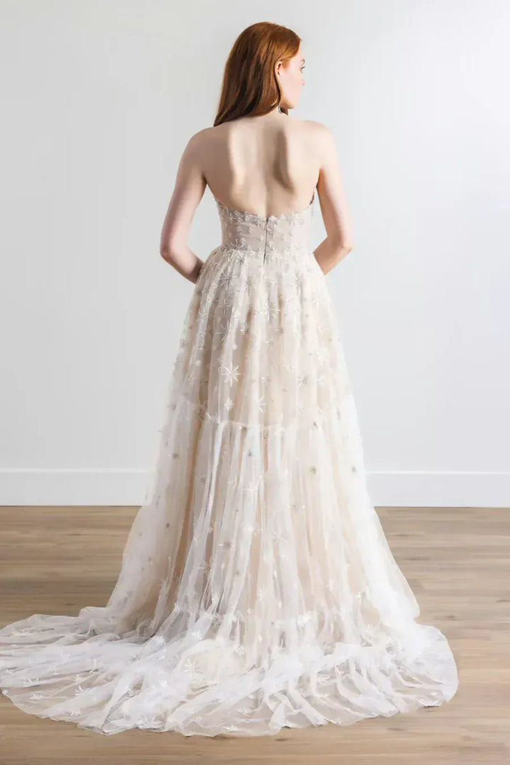 full back of willowby by watters lenny nude tulle a-line wedding dress with intricate embroidery and a chapel length train
