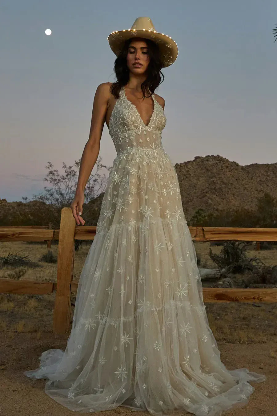 full front of willowby by watters lenny nude tulle a-line wedding dress with intricate embroidery and a halter neckline