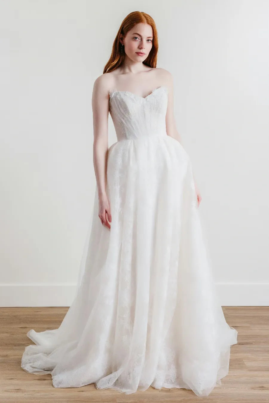full front of willowby palmer ivory embroidered tulle ball gown with a strapless sweetheart neckline