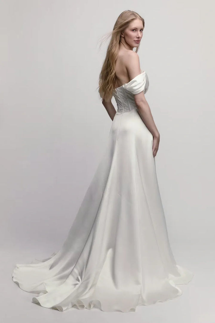 full back of willowby poppy ivory charmeuse wedding dress with detachable straps ad a high slit in the skirt