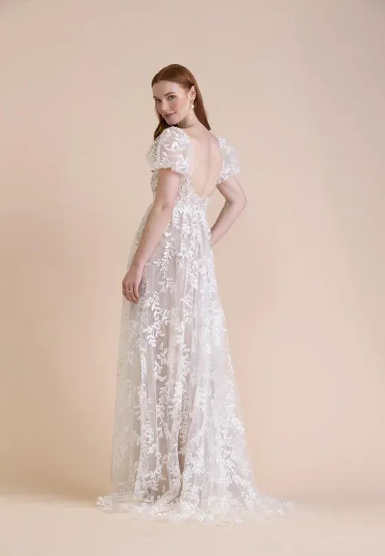 full back of willowby by watters simone nude lace sheath wedding dress with an open back and floor length skirt