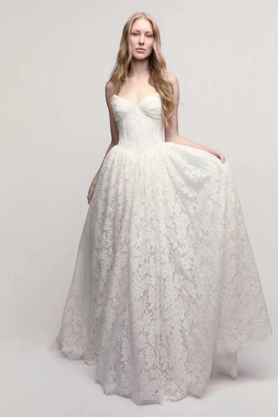 full front of willowby steffie ivory lace wedding dress with a basque waist and floral print