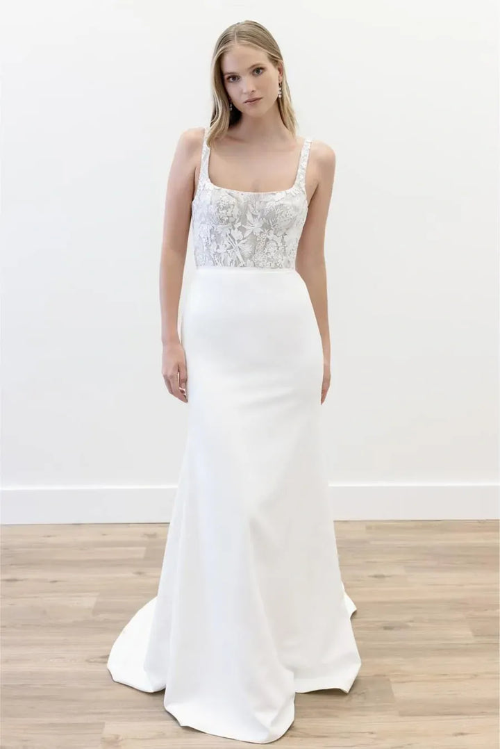 full front of willowby by watters taylie ivory crepe fitted wedding dress featuring a lace bodice with a square neckline