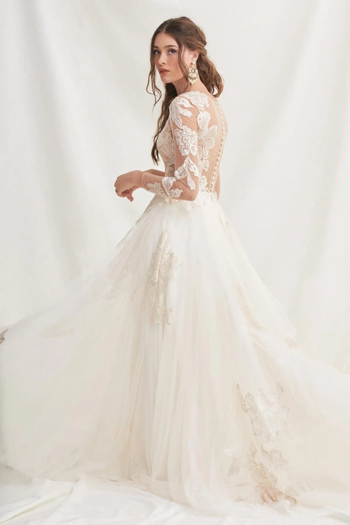 White wedding dress with lace detailing on a white background