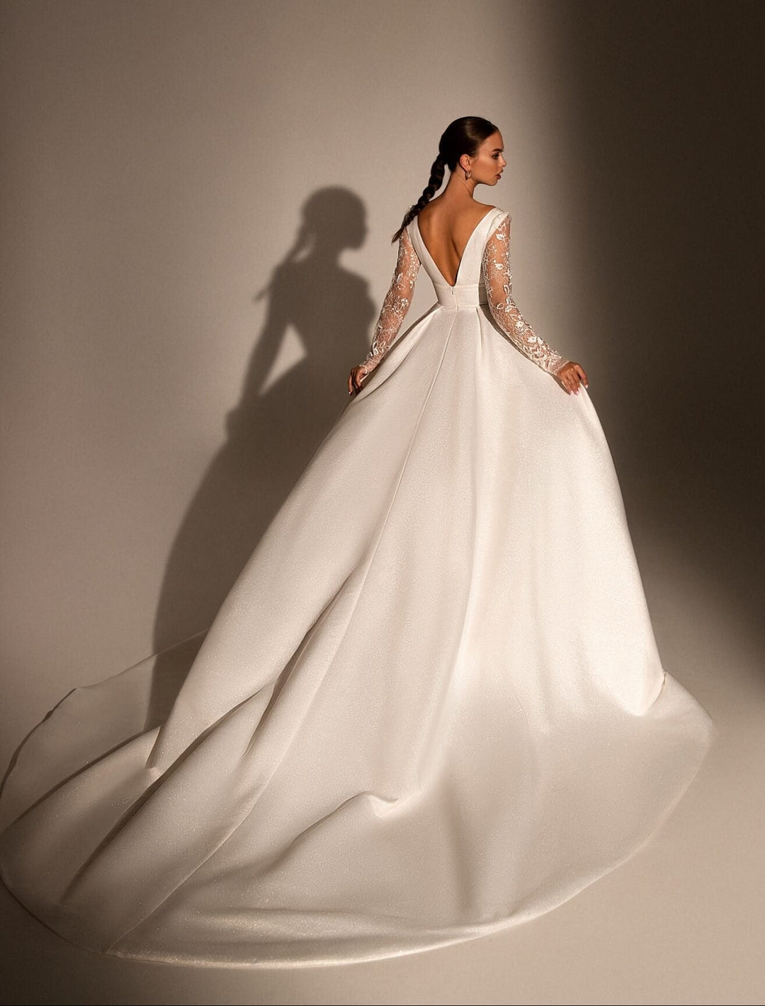 full back of wona riccarda ivory sparkle lace a-line wedding dress with a long train