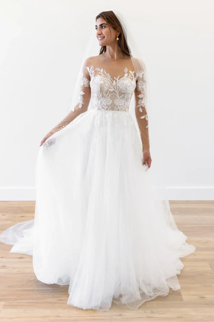 Full front of Locket by Watters Esme white tulle A-Line gown with illusion bodice and long sleeves