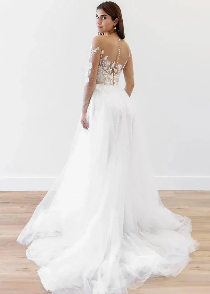 Full back of Locket by Watters Esme white tulle A Line gown with illusion bodice and long sleeves