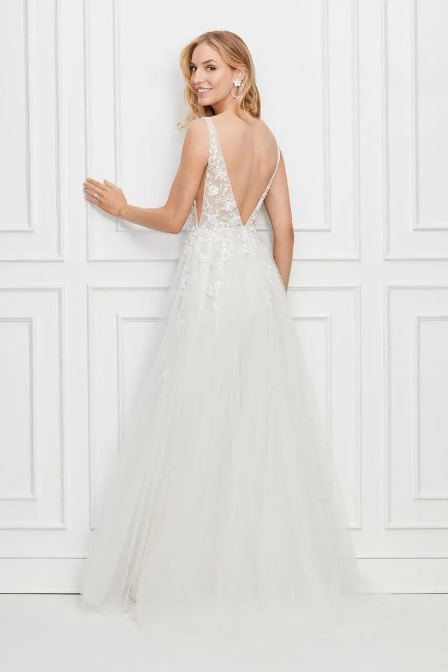 full back of locket by watters seeley ivory tulle a-line wedding dress with an open back and short train